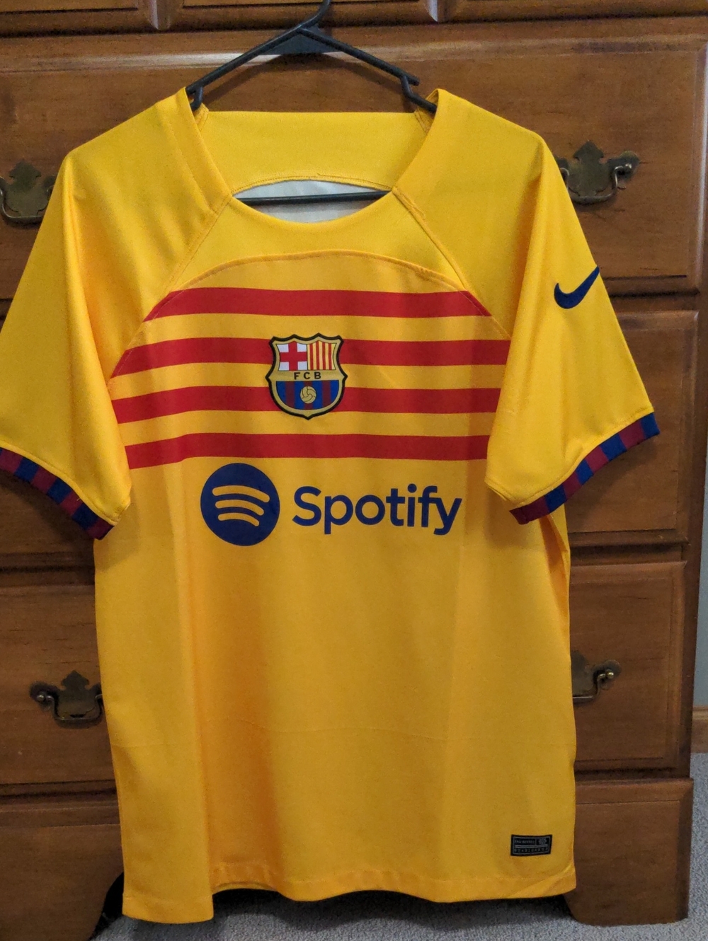 Nike Men's Yellow Barcelona Replica Away Jersey with Red Stripes and Blue Accent